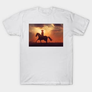 Lone cowboy at sunset, End of a cowboy film design T-Shirt